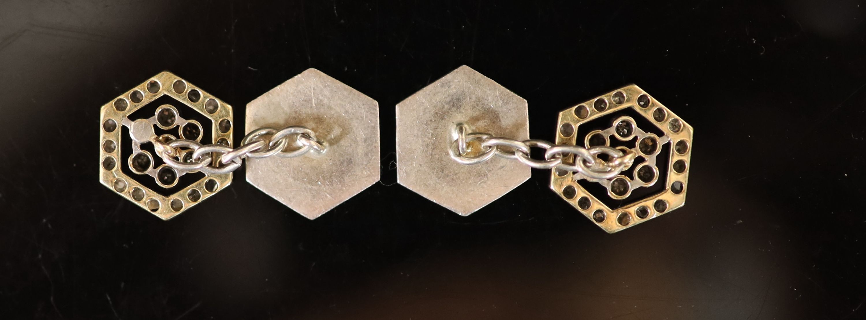 A pair of early 20th century silver and gold, rose and round cut diamond set hexagonal cufflinks